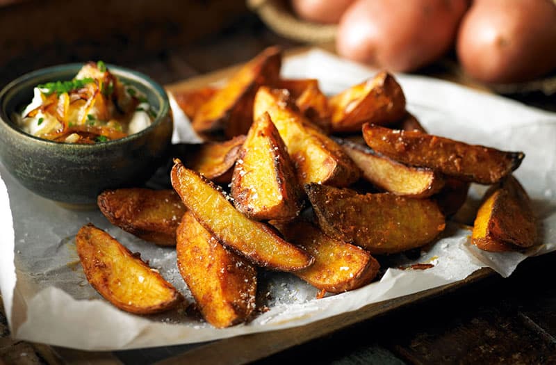 http://realfood.tesco.com/recipes/spiced-potato-wedges-with-onion-chive-and-sour-cream-dip.html 